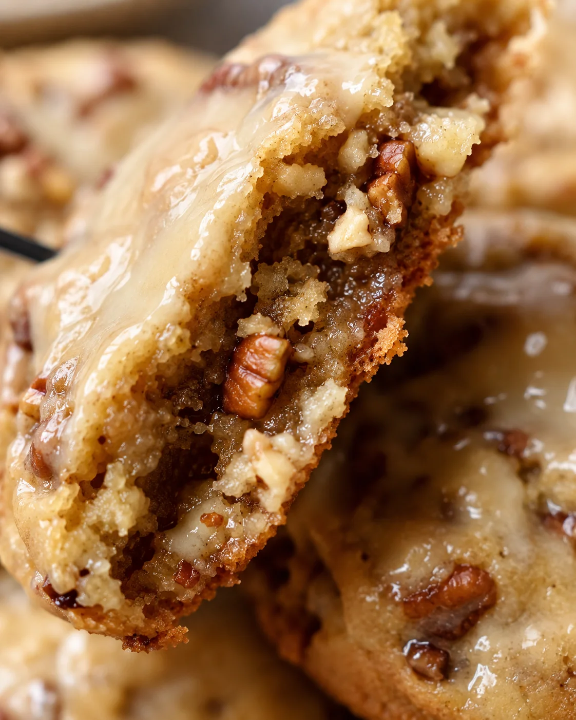 Close-up of freshly baked maple pecan cookies with glossy maple glaze