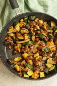 This quick and easy combines onions, mushrooms, zucchini, and garlic, and zucchini with a few dried herbs and spices for a great summer side dish that goes with almost anything.