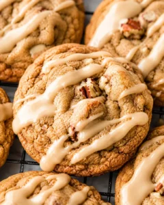 Close-up of freshly baked maple brown sugar cookies drizzled with maple icing