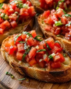Close-up of fresh tomato bruschetta on toasted bread with basil
