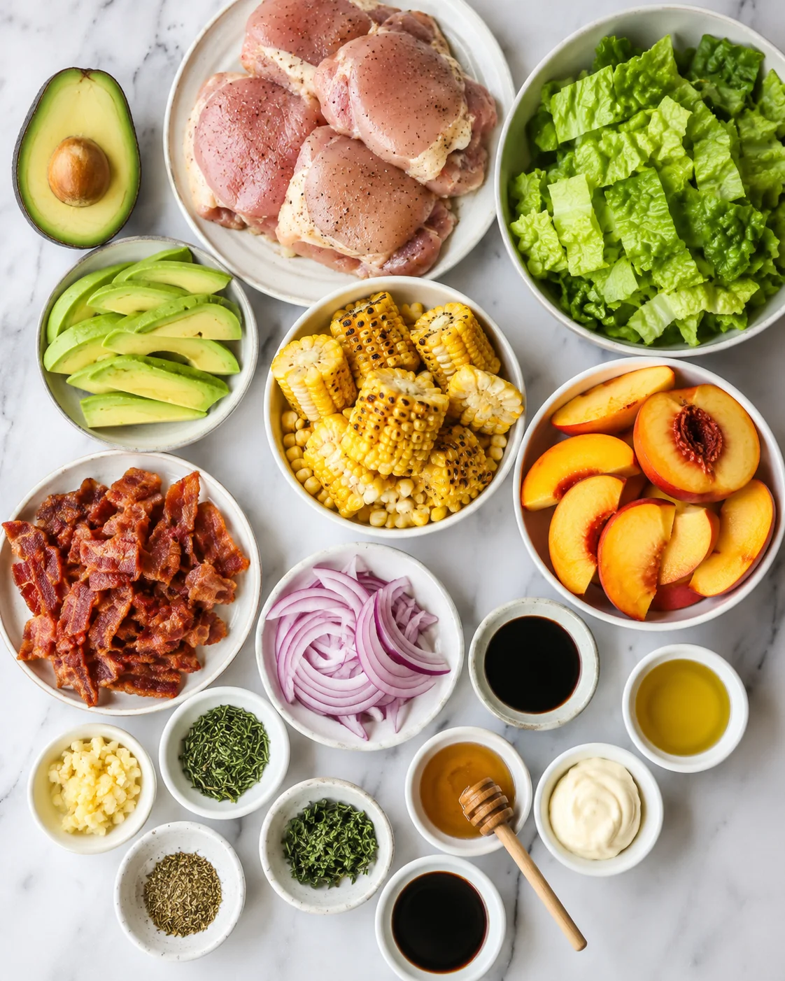 Colorful ingredients for rosemary chicken and peach salad with bacon and corn