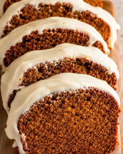 Moist pumpkin bread topped with smooth cream cheese frosting and warm spices