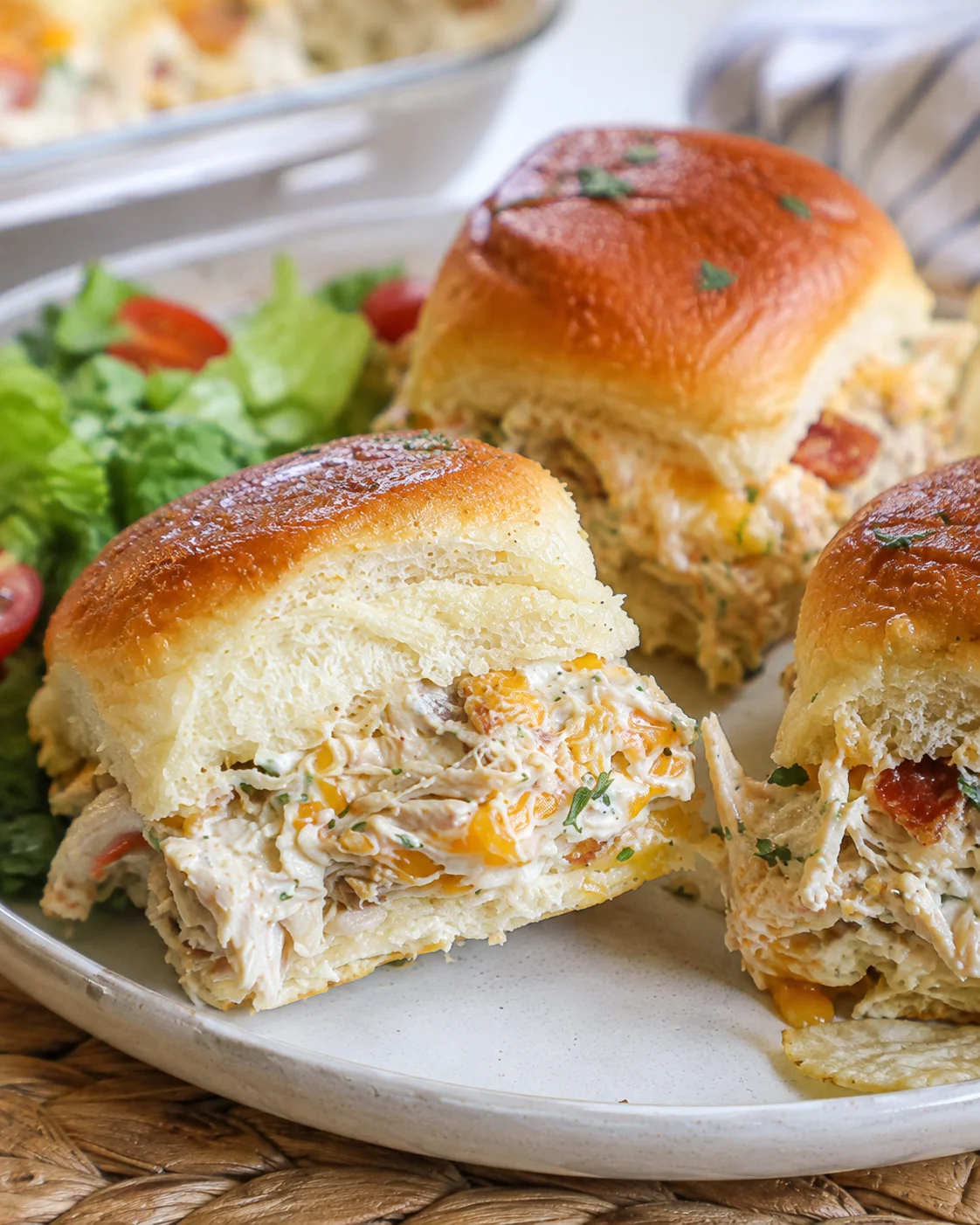 Plated Chicken Bacon Ranch Sliders served with a side salad