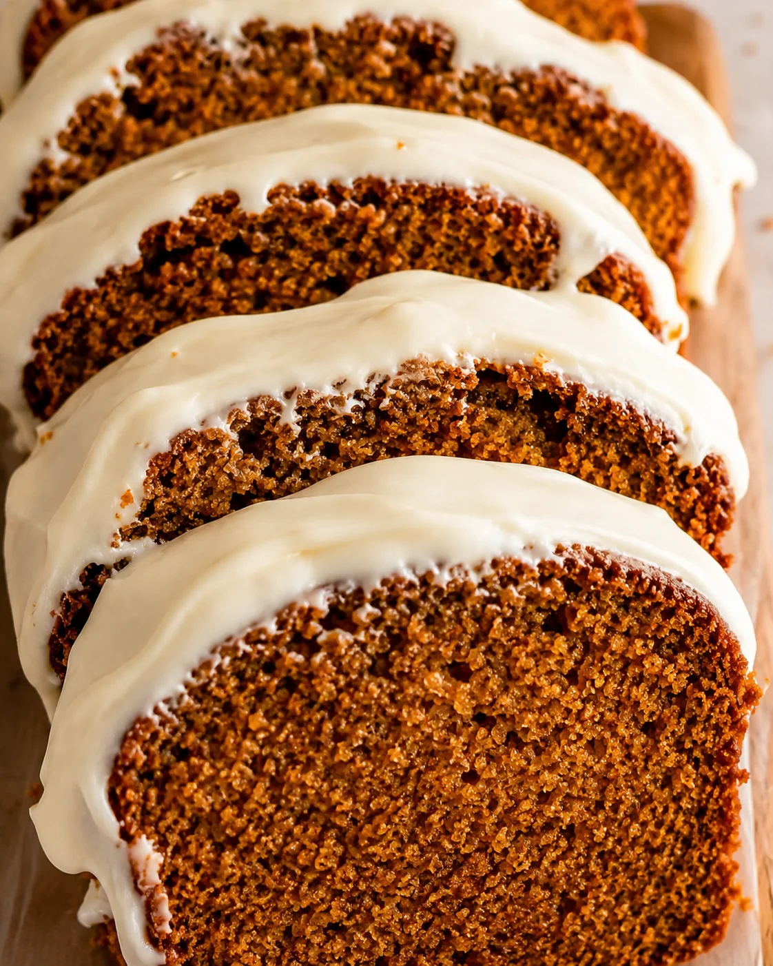 Moist pumpkin bread topped with smooth cream cheese frosting and warm spices
